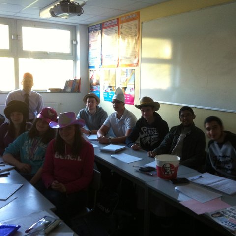 Classroom full of Turton Media Arts College students wearing hats at their desks, 2011