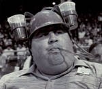 Someone wearing a novelty beer-can hat