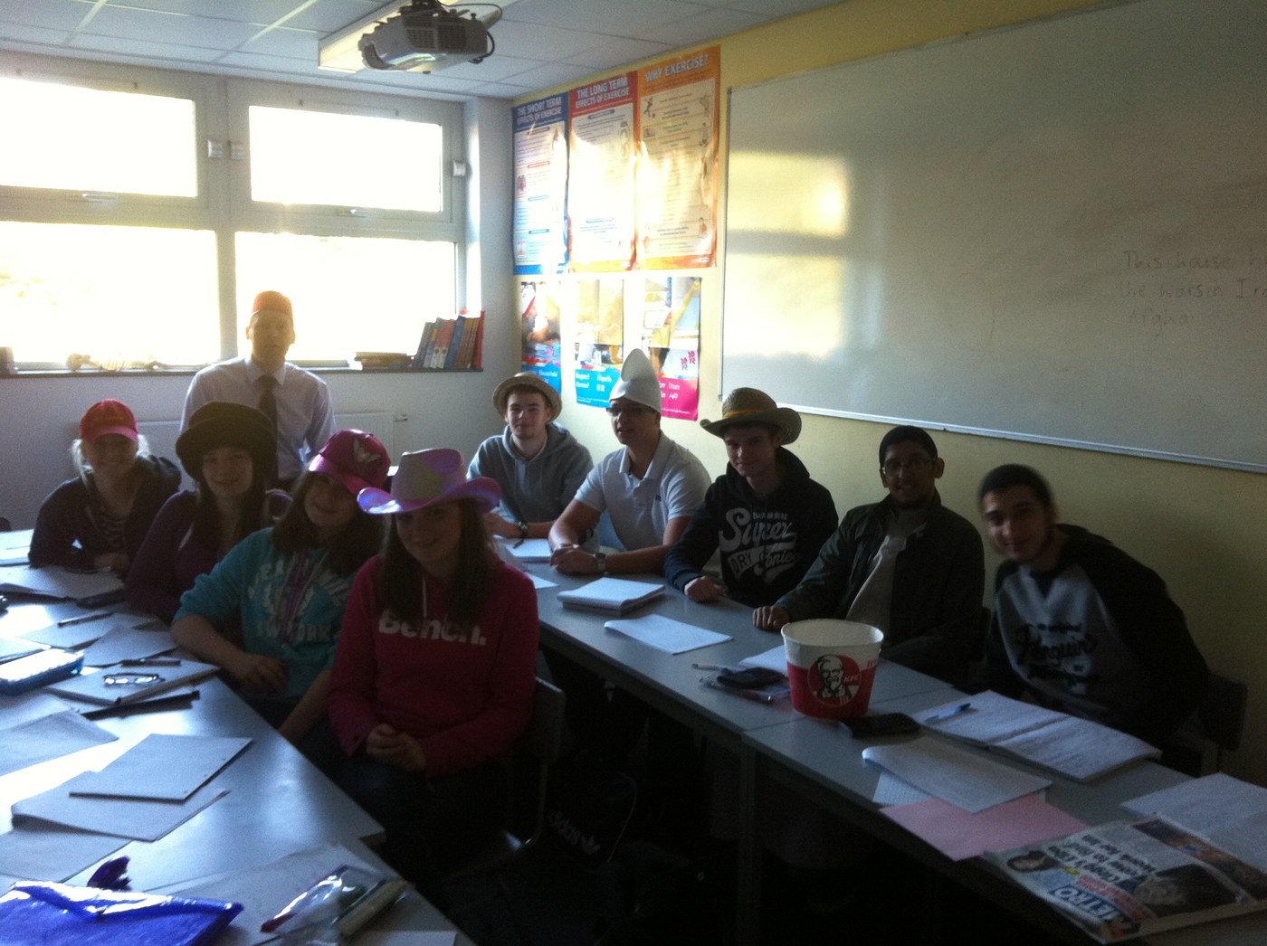 A classroom at Turton Media Arts College with students at desks, nearly everyone wearing a hat for International Hat Day 2011